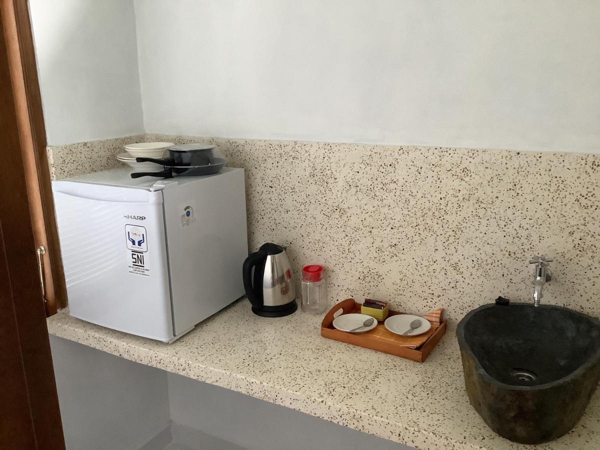 Villa Iris Homestay อูลูวาตู ภายนอก รูปภาพ